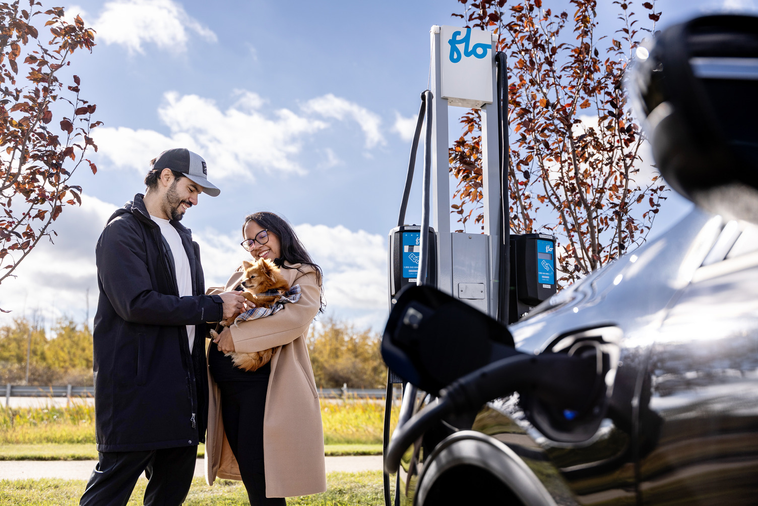 Couple charging at FLO charger